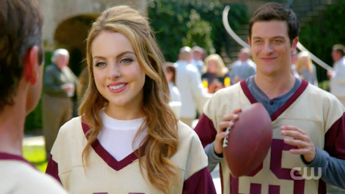 Fallon and Steven smile in family jerseys.