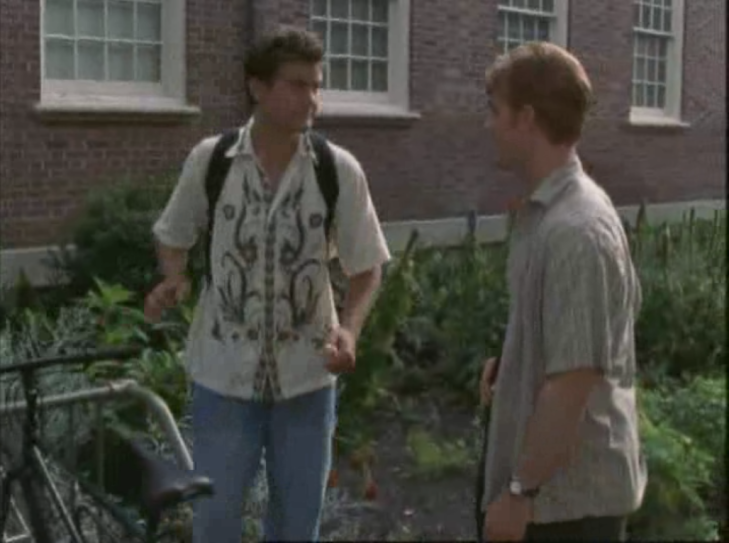Pacey wears a white linen buttondown with like... swirly dragon patterns on it.