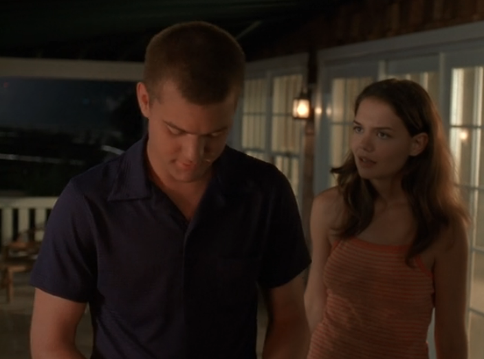 Image: Joey looking at Pacey angrily, Pacey looking down