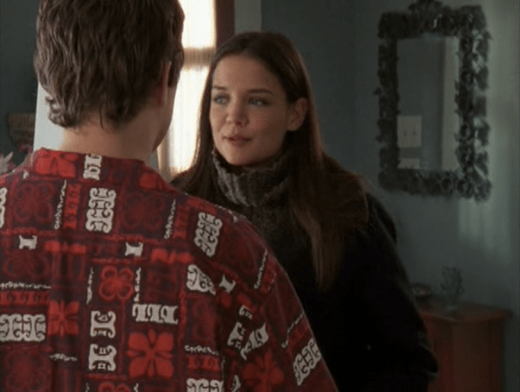 Joey in her foyer, facing Pacey, with her turtleneck unrolled
