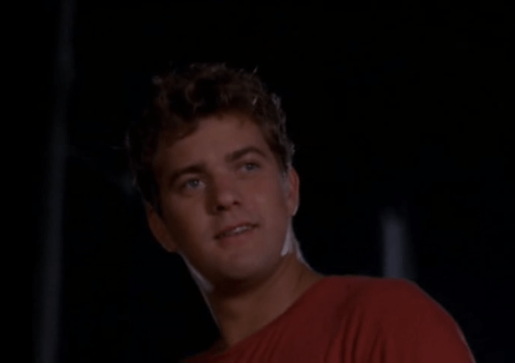 Exterior, night. Closeup of Pacey smiling.